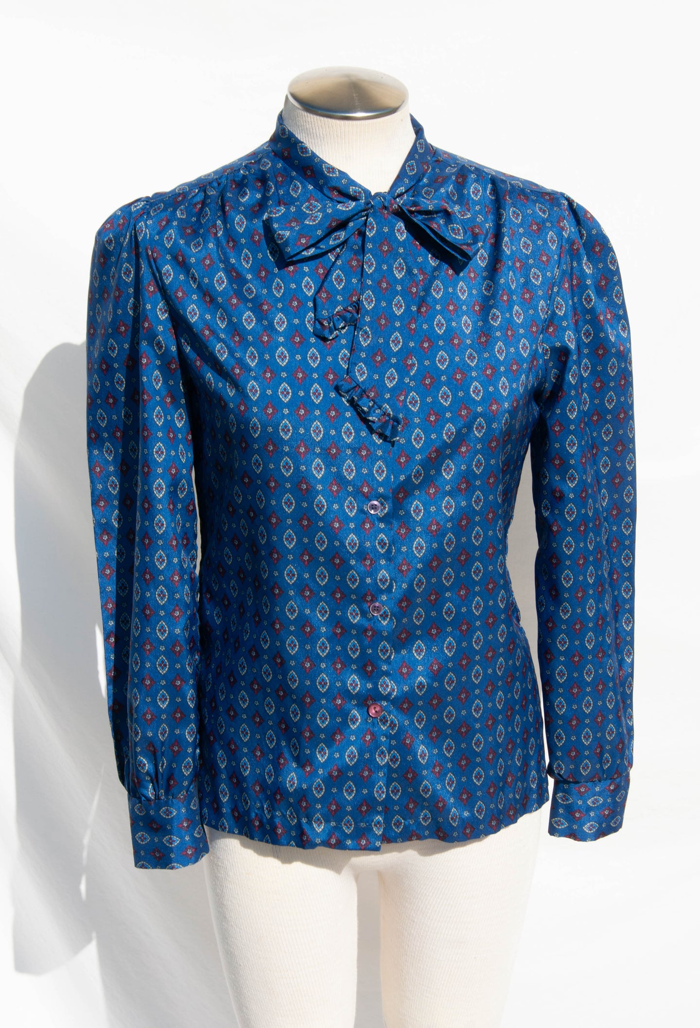 RAGAZZA VINTAGE BLUE AND RED PRINTED PUSSYBOW TOP